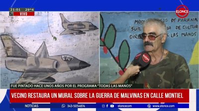 Vecino restaura un mural sobre la Guerra de Malvinas en calle Montiel